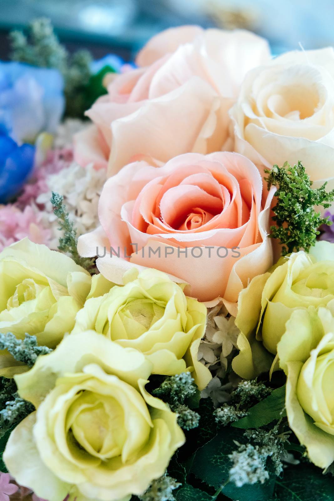 Floral background. artificial flowers in a colorful