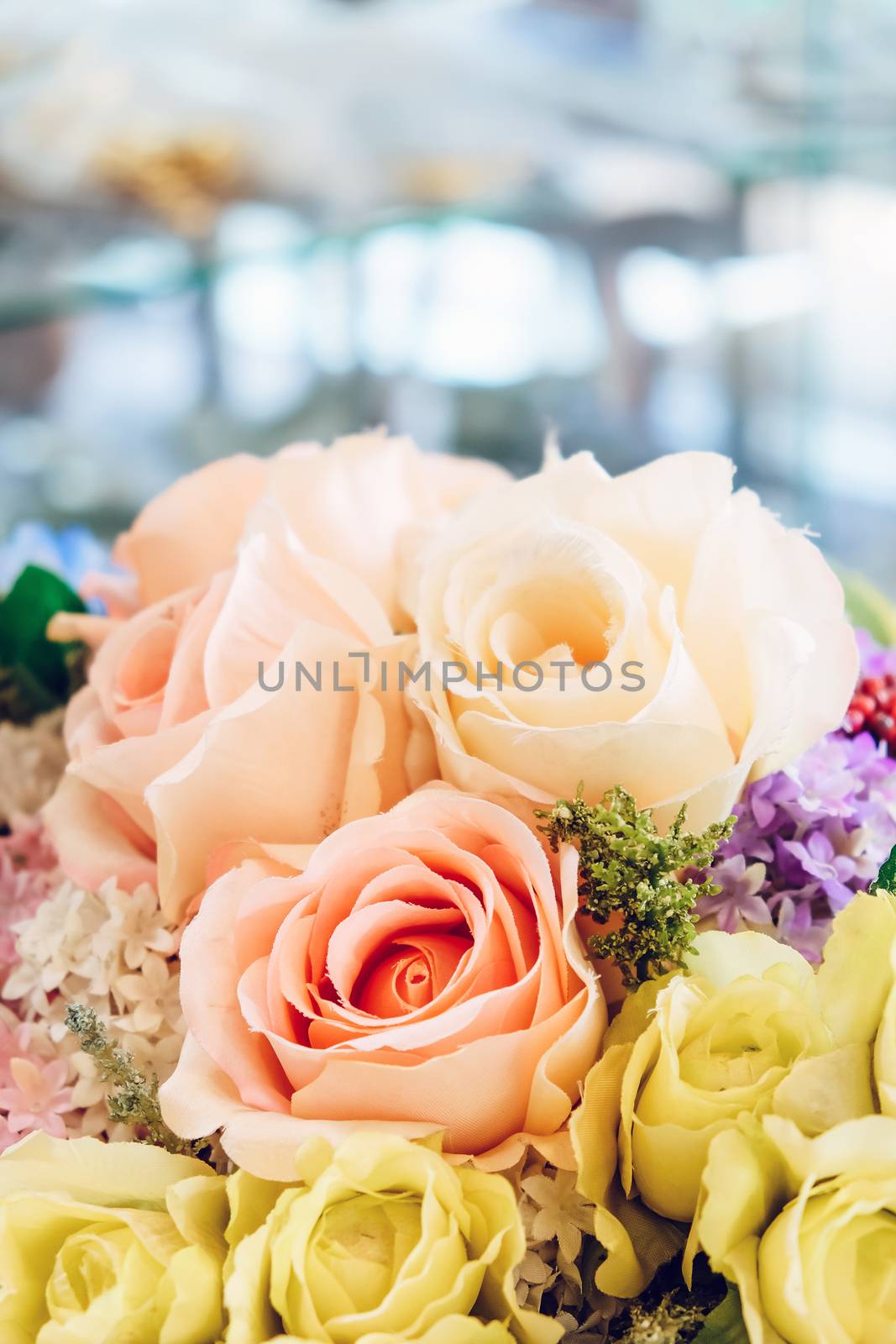 Floral background. artificial flowers in a colorful