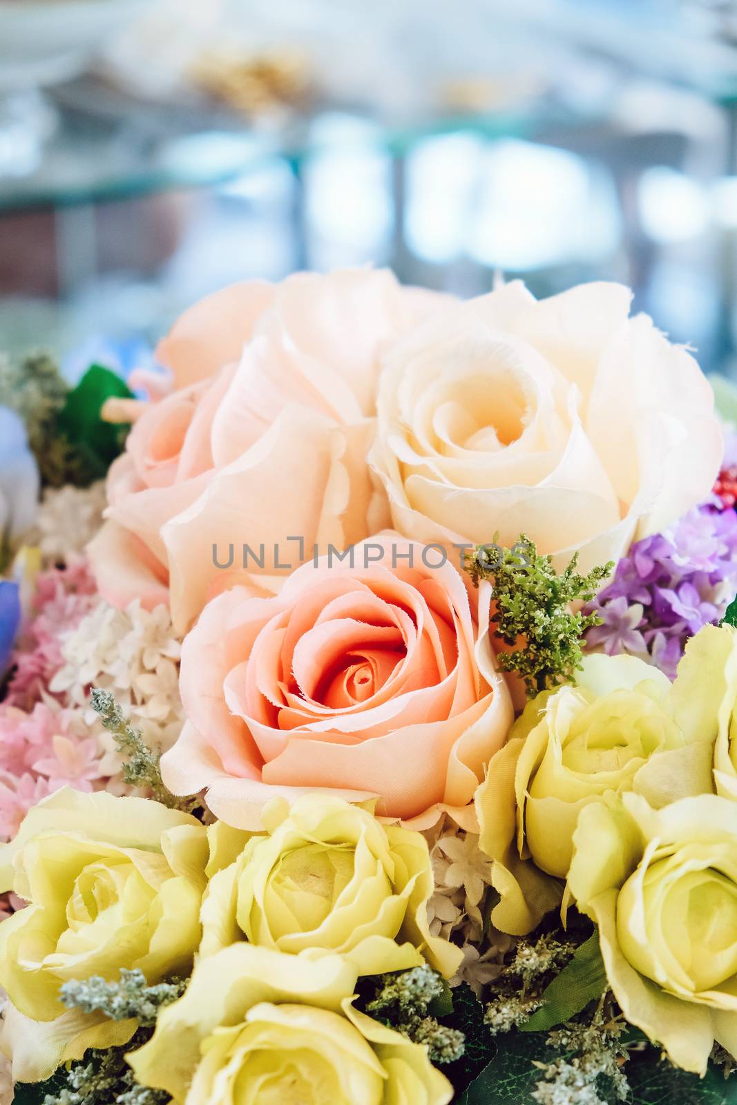 Floral background. artificial flowers in a colorful