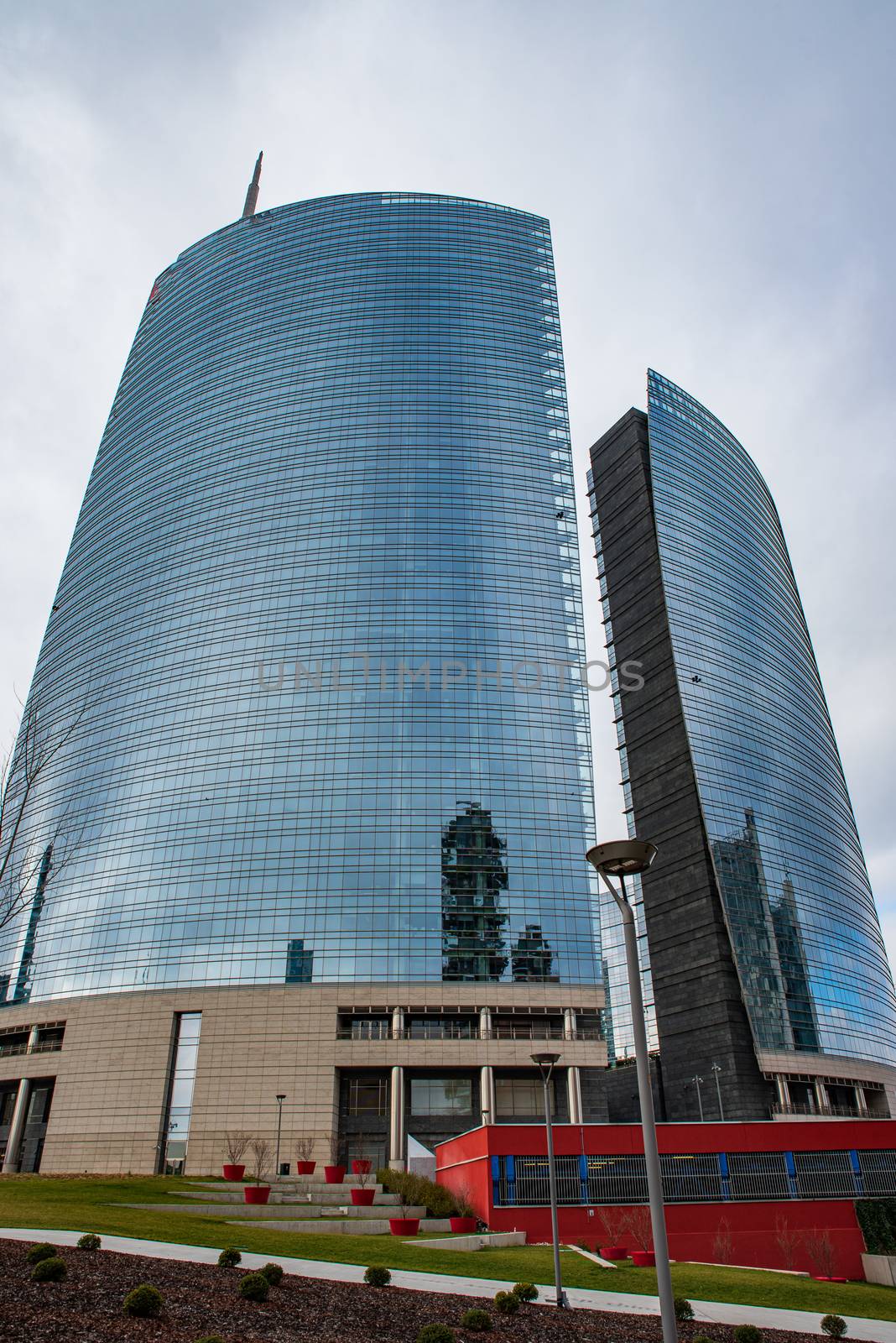 Urban landscape depicting skyscrapers with stained glass windows by brambillasimone