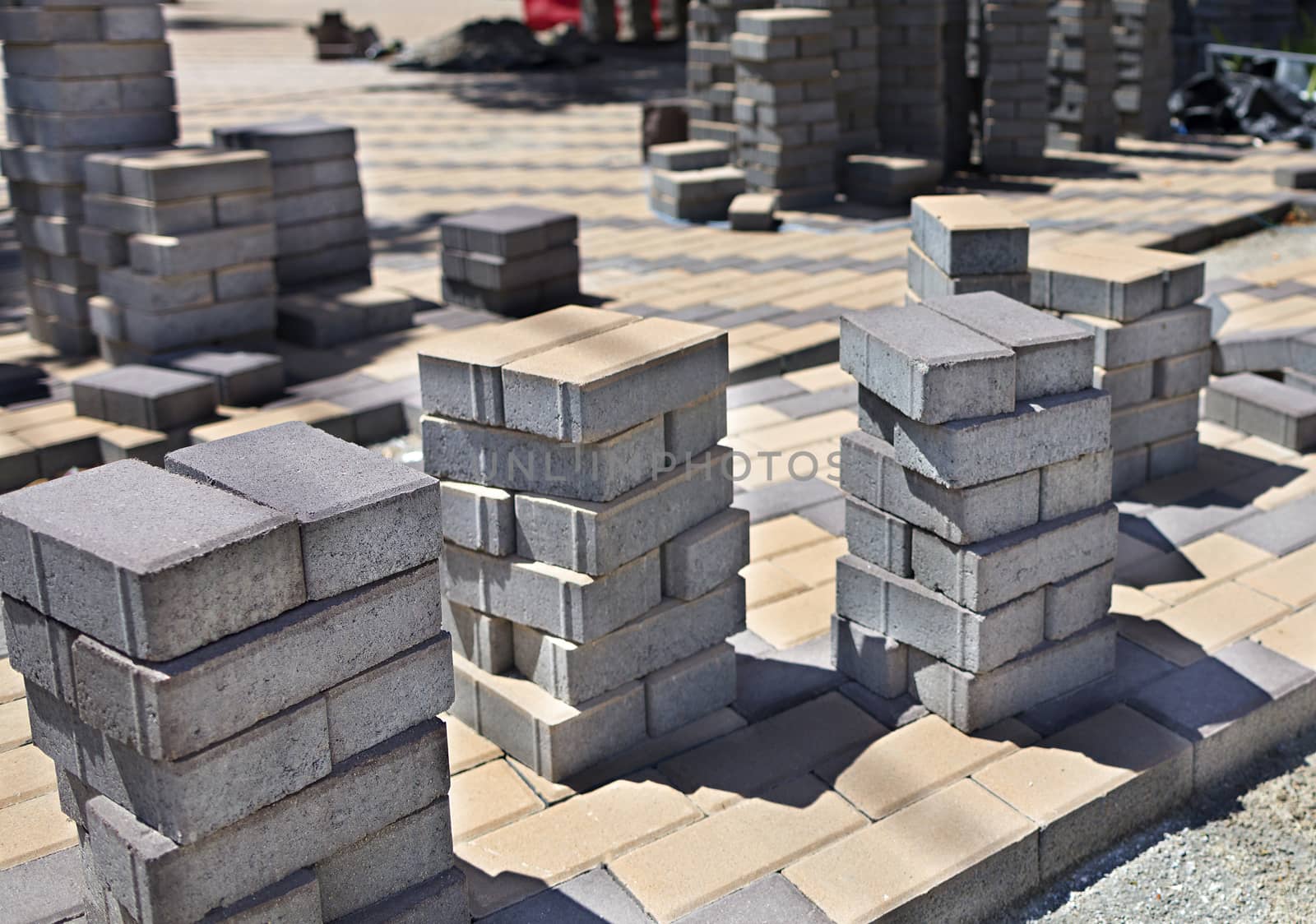 Stack of paving slabs on the construction site for equipping the city street pavement