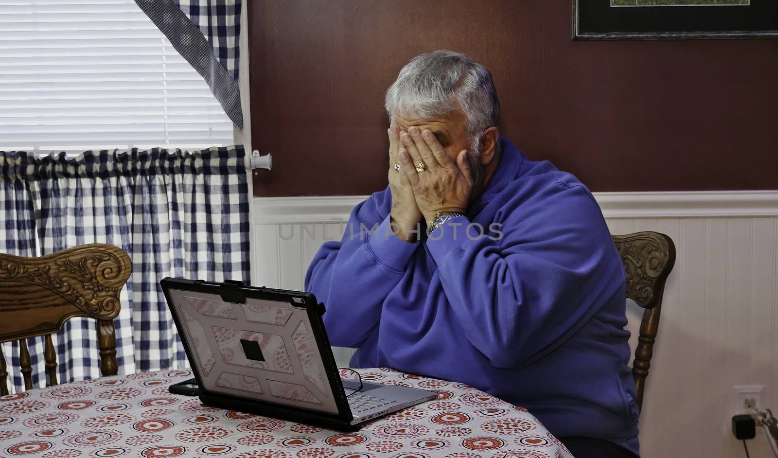 Senior Upset and Mad at Using a Computer and Technology by actionphoto50