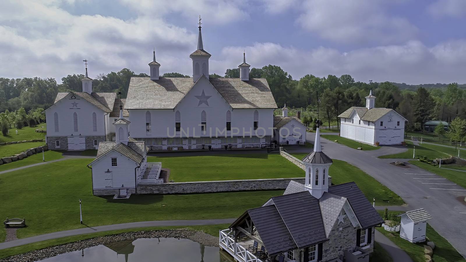 Aerial View of a Old Barns with Steeple or Cupola as Seen by a Drone Aerial View of a Old Barns with Steeple or Cupola as Seen by a Drone