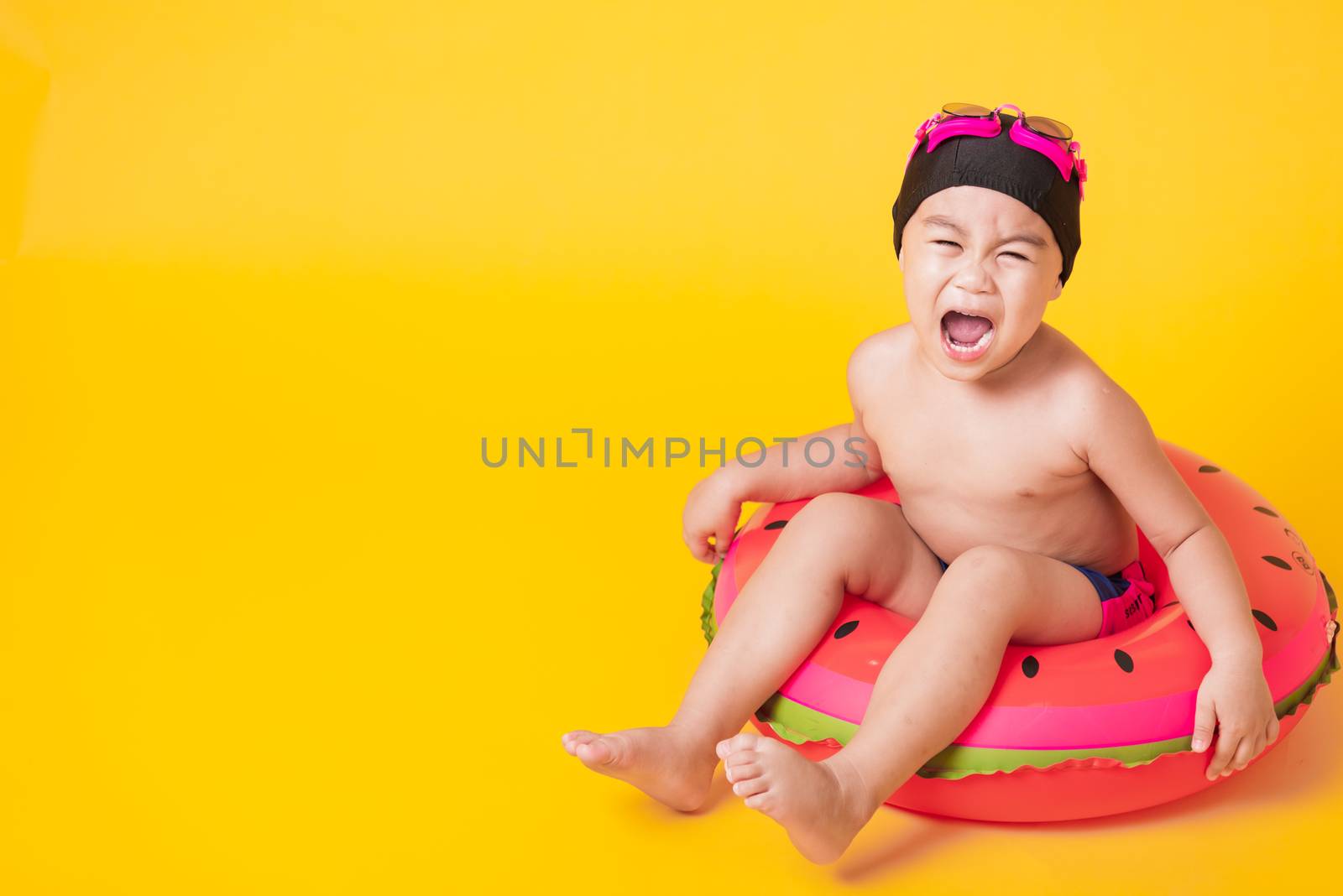 Kid hav fun sit in inflatable by Sorapop