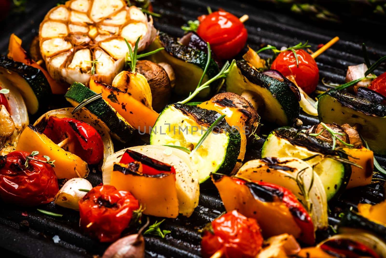 BBQ Grilled Wegetables on Skewers with Fresh Herbs and Spices. Summer Barbecue Food.