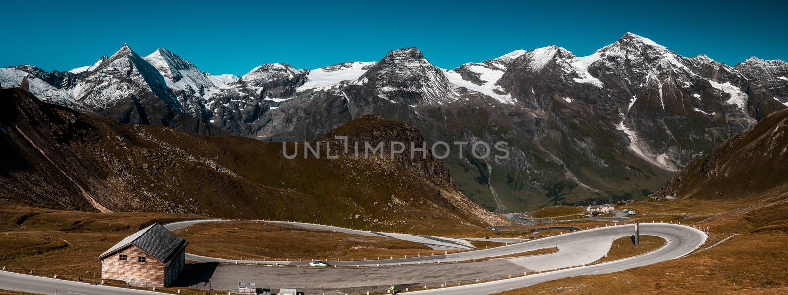 Grossglockner High Alpine Road in Austria Alps. Wide Stitched Panoramic Image. Outdoor Adventure Panorama.