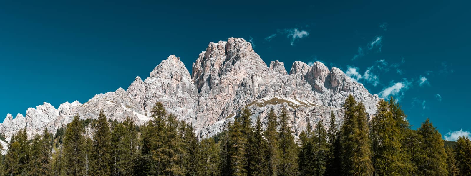 High Mountains Peak and Blue Sky. Wide Panoramic Image. Outdoor  by merc67