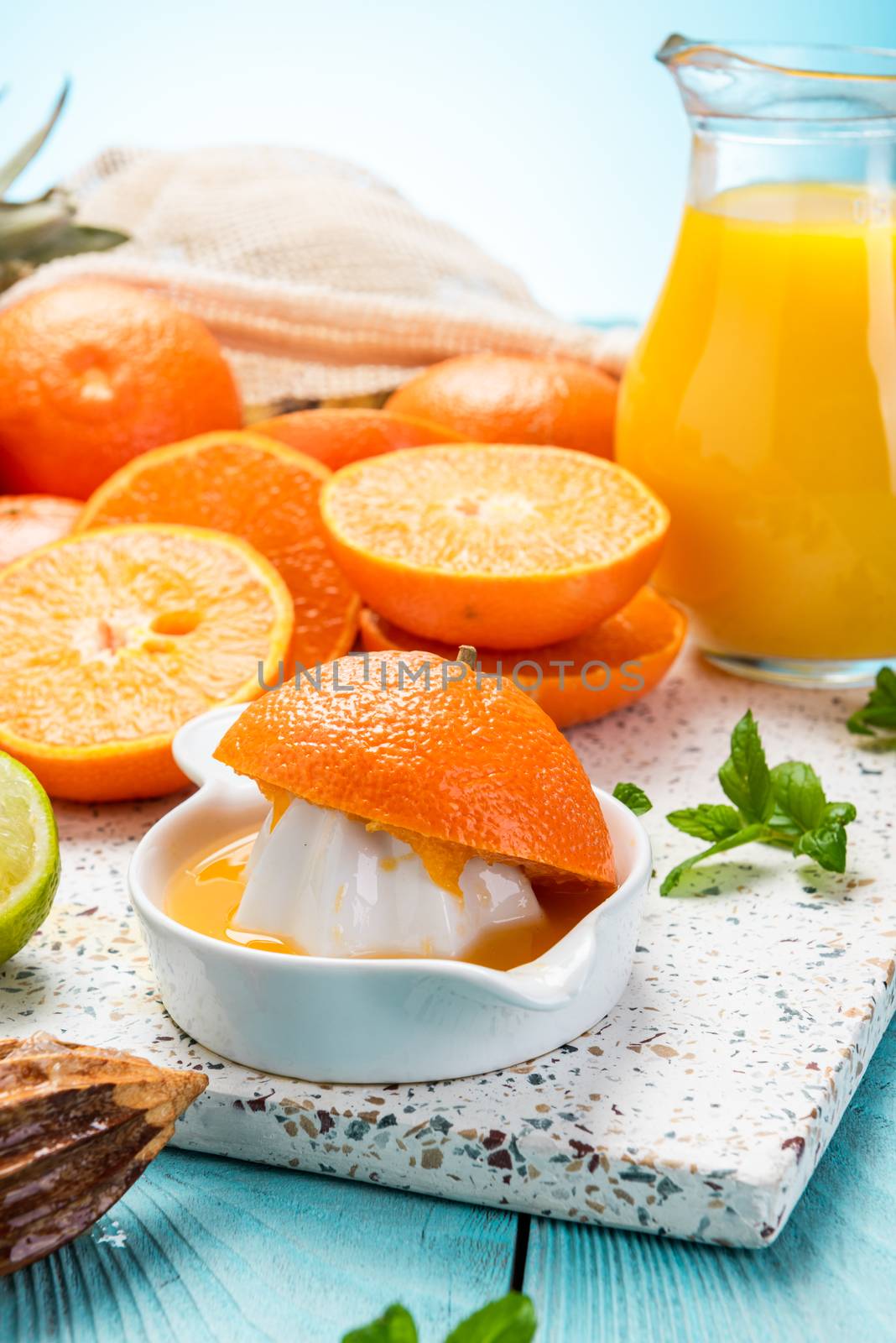 Homemade Healthy Orange Juice. Making Refreshing Healthy Beverage at Home.