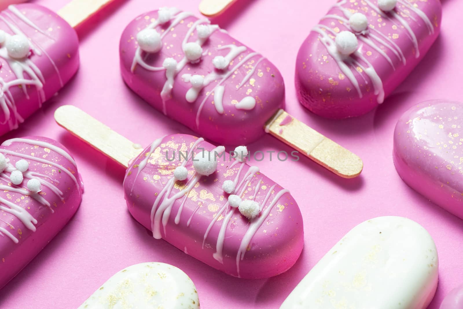 Modern Composition of Pink Pastel Popsicles. Sweet Food Geometric Design. Flat Lay.