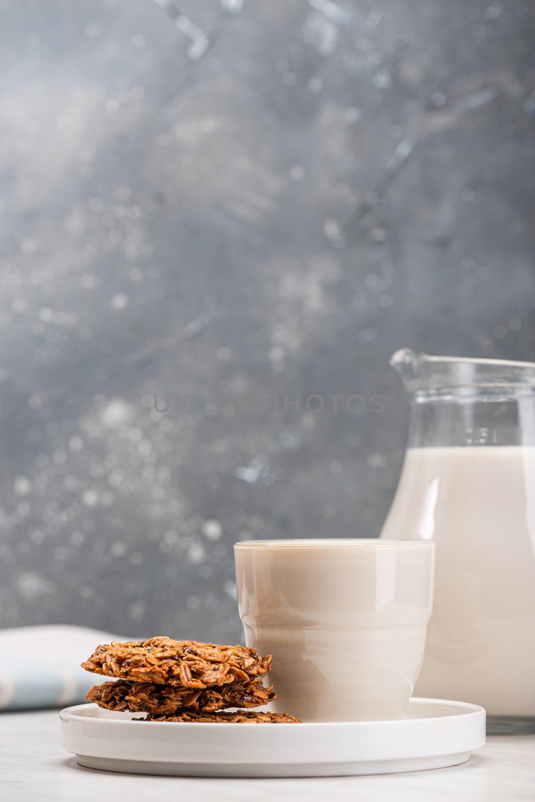 Soy or Soya Milk and Oat Cookies on Kitchen Table. Plant Based V by merc67