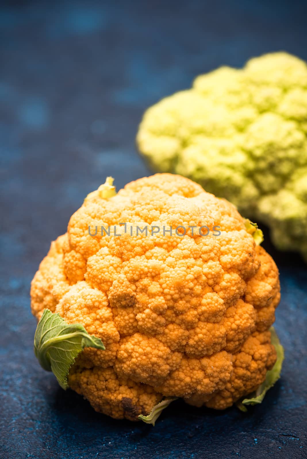 Yellow and Green Cauliflowers on Vibrant Background by merc67