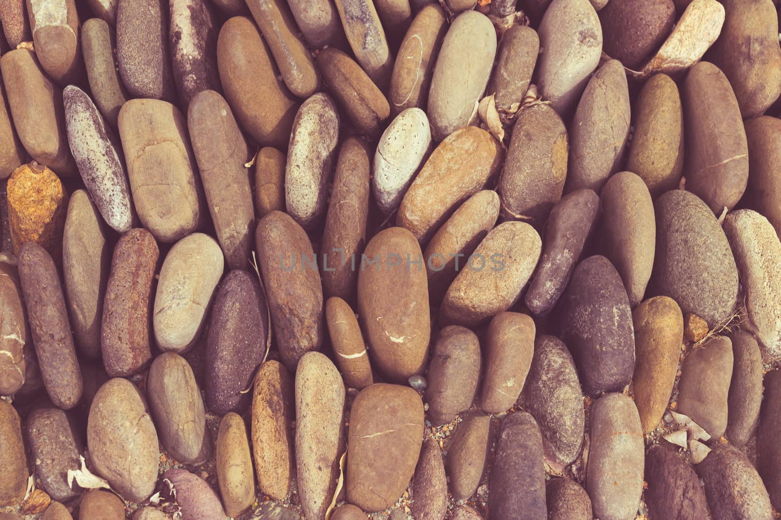 Photograph of a rounded river rocks background