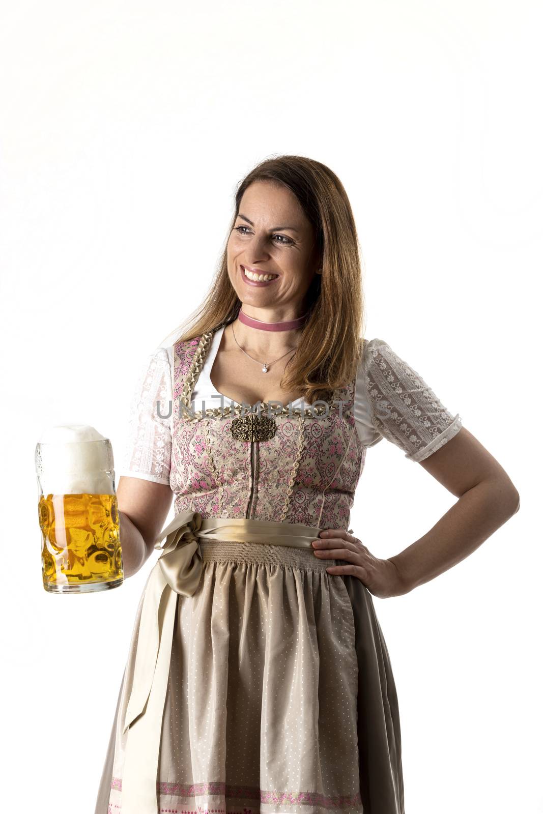 bavarian woman in a dirndl with beer