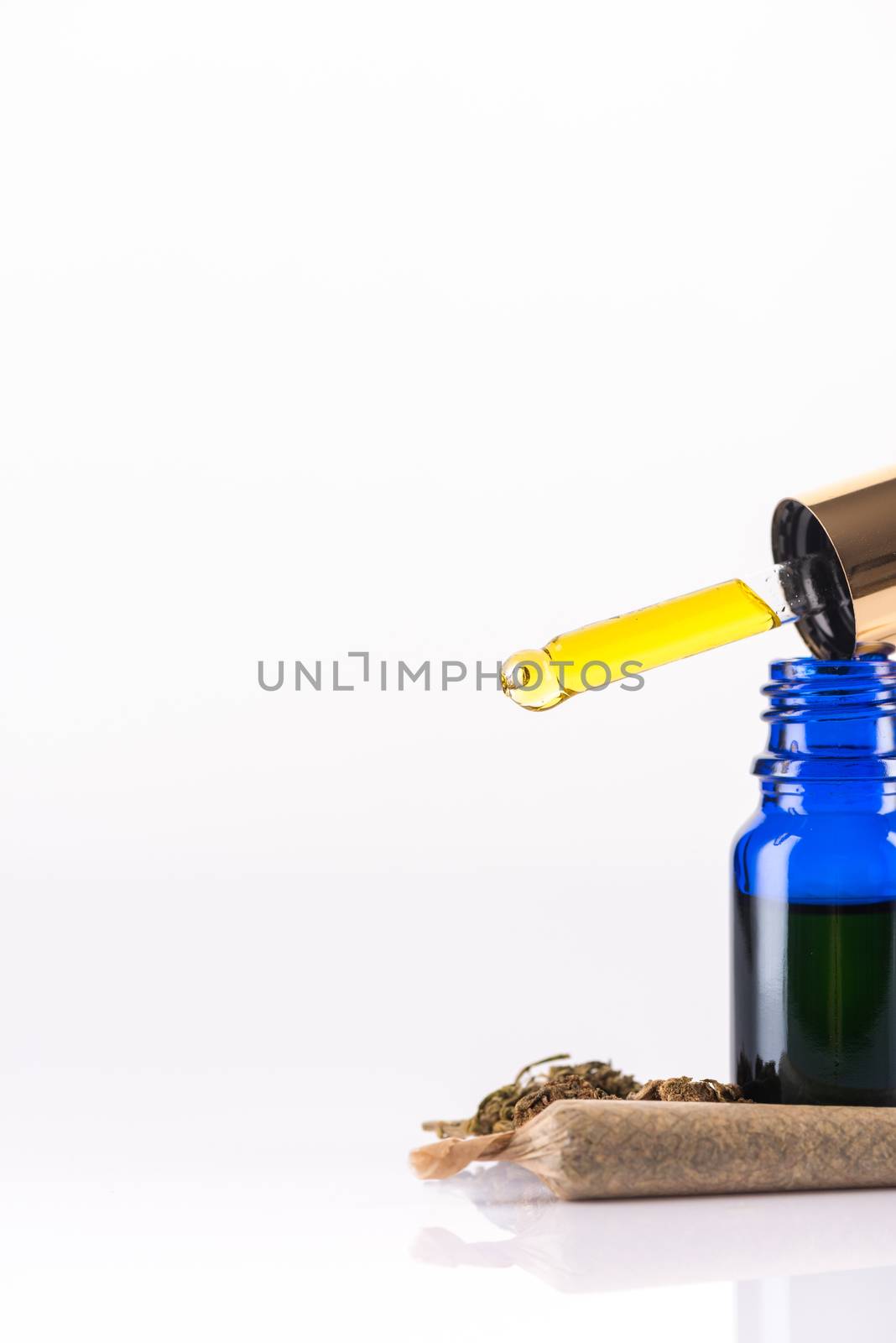 Droplet with CBD Cannabidiol Oil. MCannabis Marijuana Medical Ex by merc67