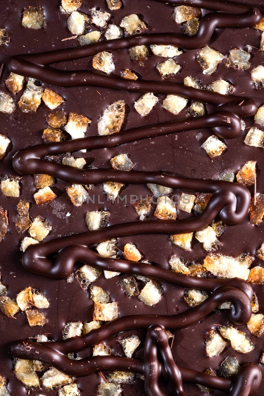 Chocolate Bar Topped with Freeze - Dried Fruits. Top Down Closeup View.