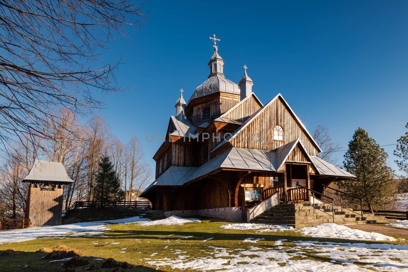 Wooden Orthodox Church in Hoszow. Carpathian Mountains and Bieszczady Architecture in Winter.