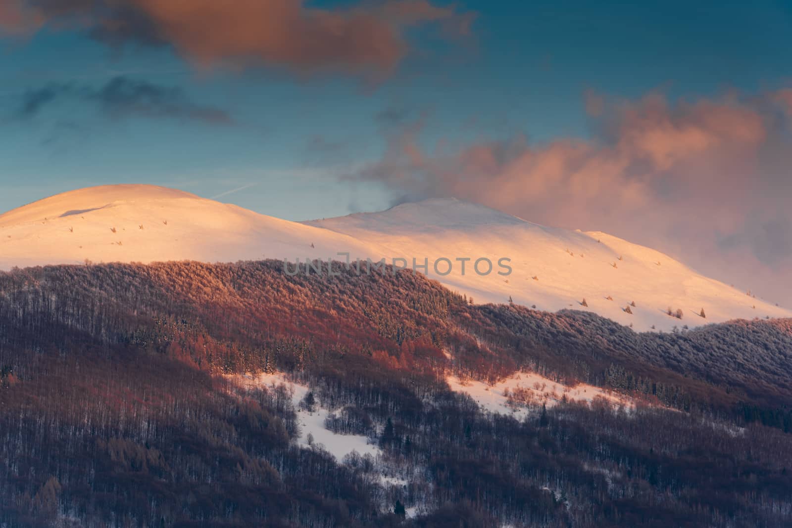 Sunrise over Polonyna Wetlinska and Carynska in Carpathian Mountains. Bieszczady, Poland at Winter Season.