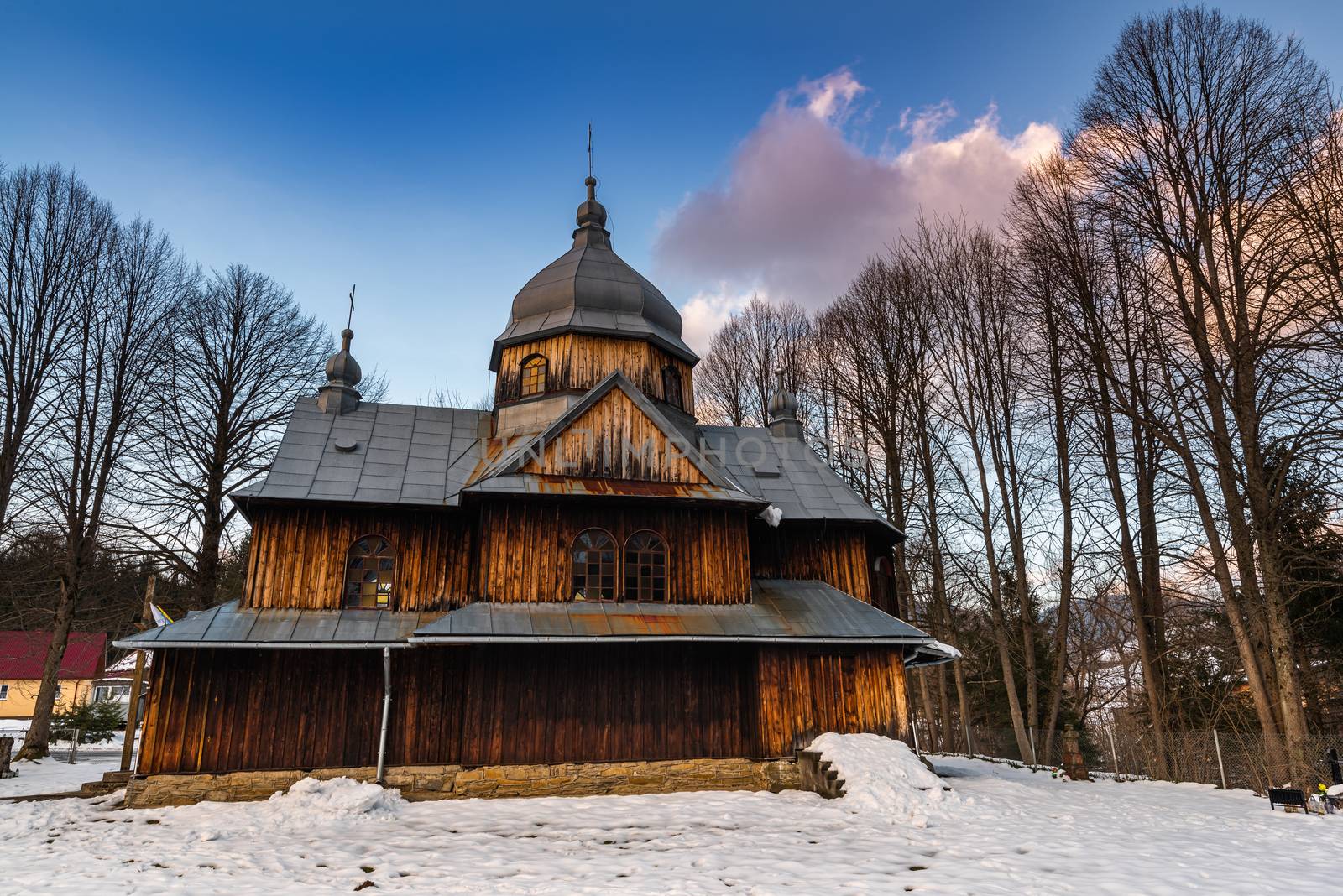 Exterior of St. Nicholas Orthodox Church in Chmiel.  Bieszczady Architecture in Winter. Carpathia Region in Poland.