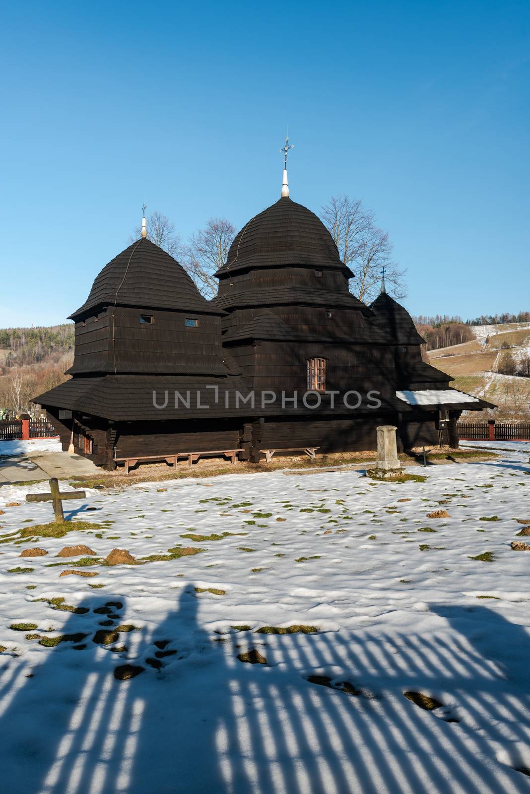Wooden Orthodox Church in Rownia. Carpathian Mountains and Bieszczady Architecture in Winter.