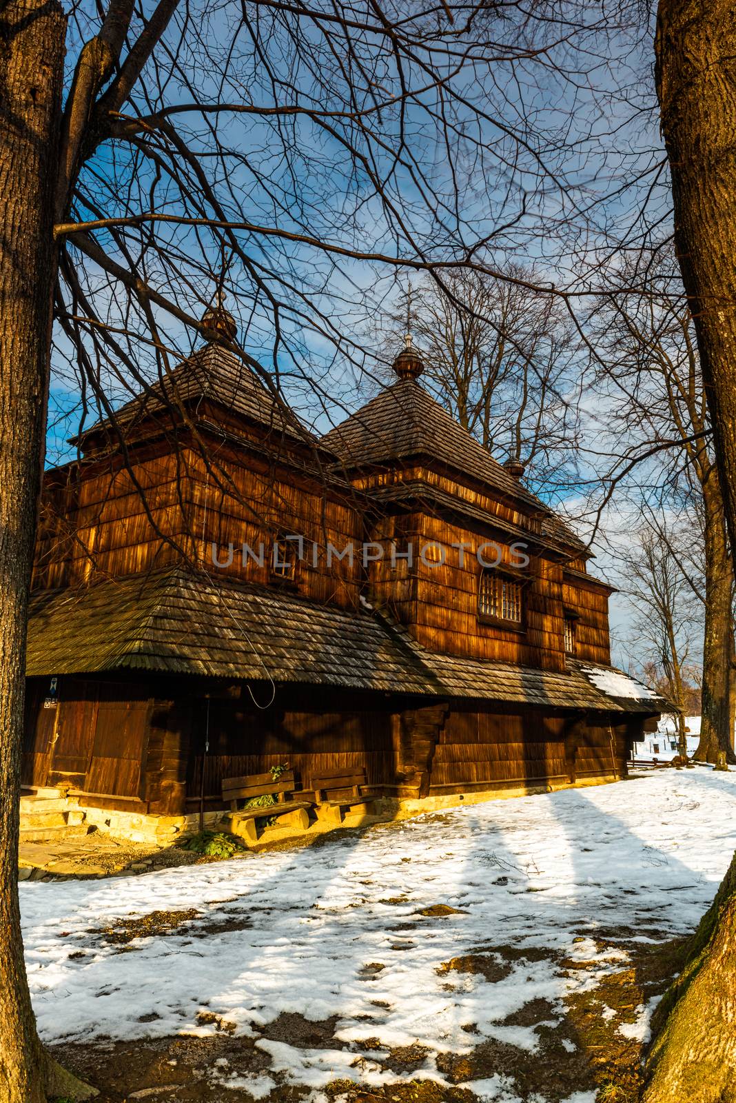 Exterior of Smolnik Wooden Orthodox Church.  Bieszczady Architecture in Winter. Carpathia Region in Poland.