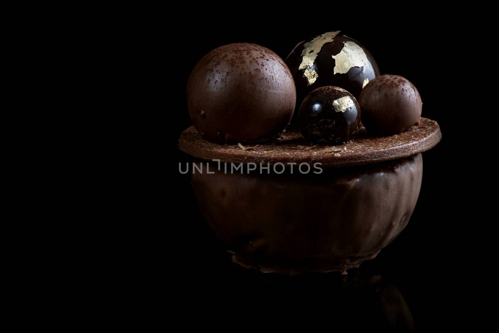 Artisan Monoportion Cake. Handmade Chocolate Dessert. Black Background.