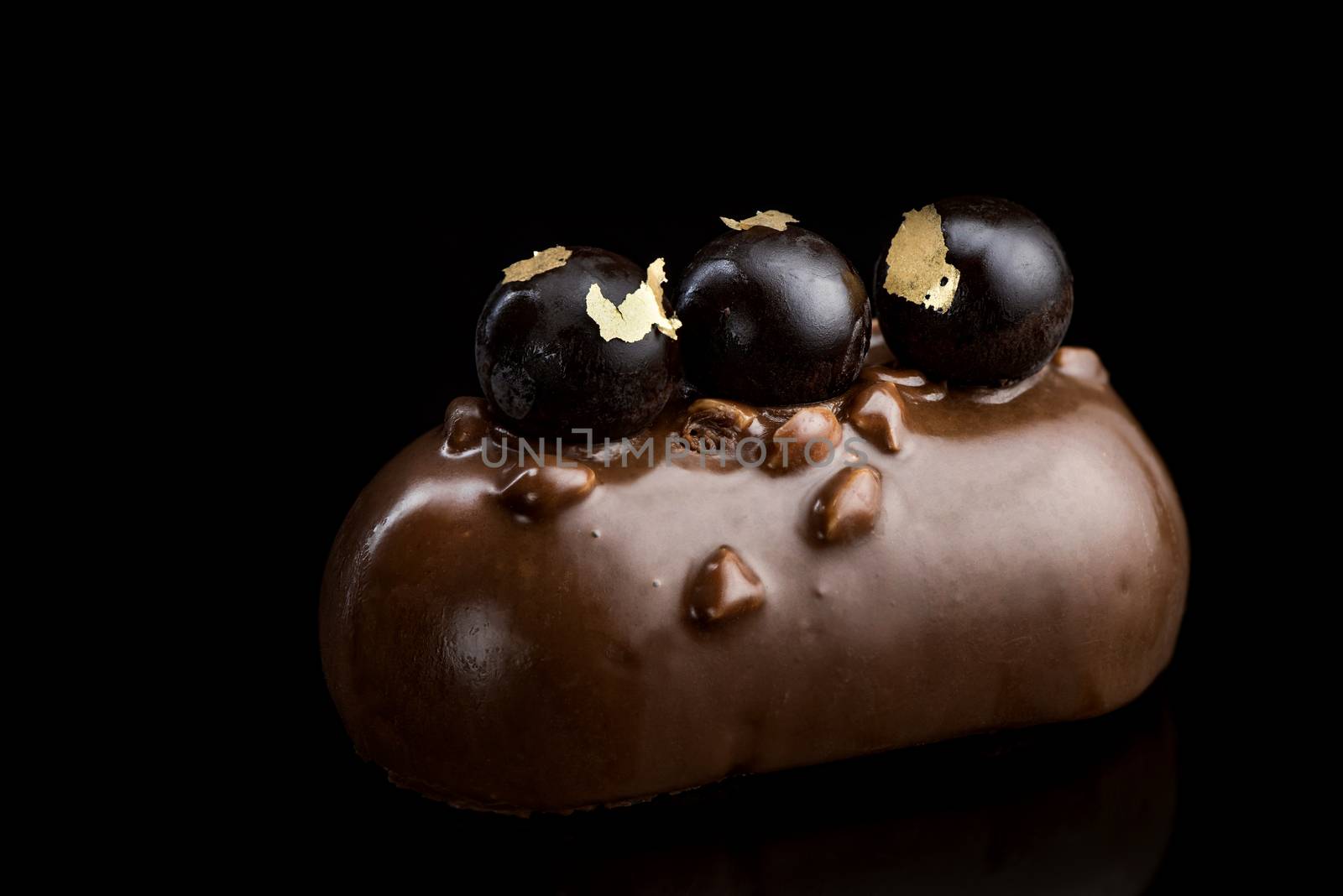 Artisan Monoportion Cake. Handmade Chocolate Dessert. Creative Patisserie. Black Background.