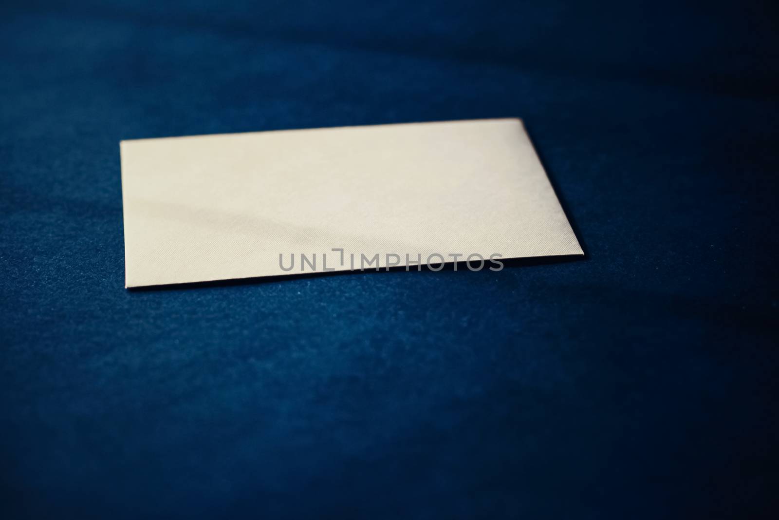 Blank beige paper card on blue background, business and luxury brand identity mockup by Anneleven