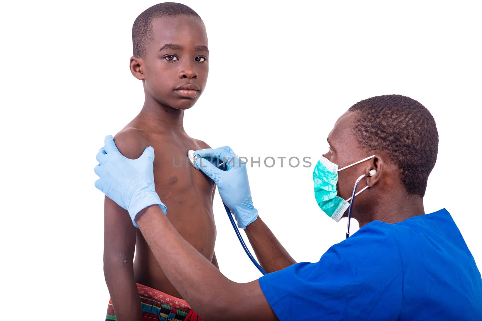 young doctor examining little boy by stethoscope. by vystek