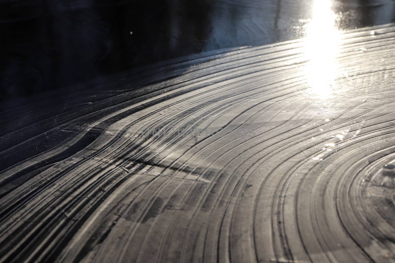 Ice Lake Lines Pattern Surface Background Texture. Wavy Drawings of Ice Lines on a Frozen Lake.