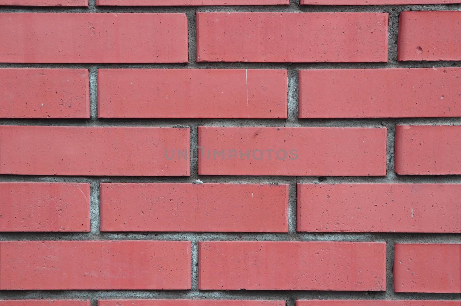 Red bricks wall building facade texture.