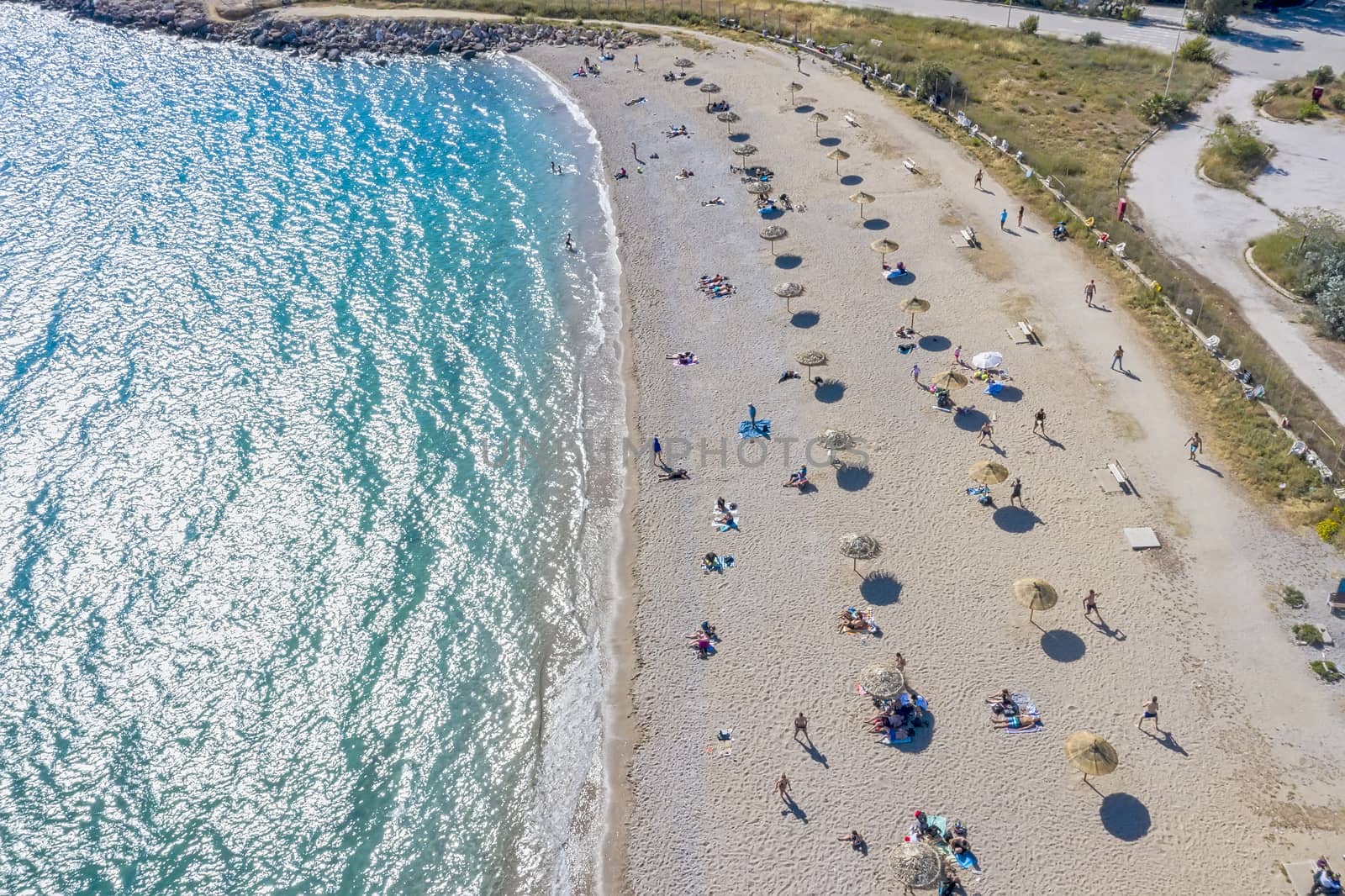 The new beach of Glyfada, adapted to the time of coronavirus implementing strict sanitary rules and safe distance keeping to avoid congestion