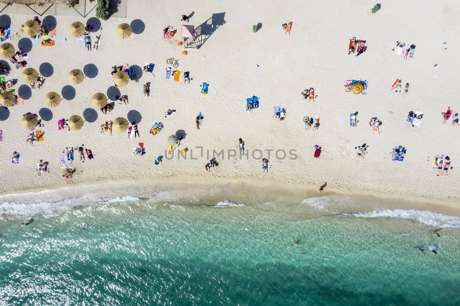 The new beach of Glyfada, adapted to the time of coronavirus implementing strict sanitary rules and safe distance keeping to avoid congestion