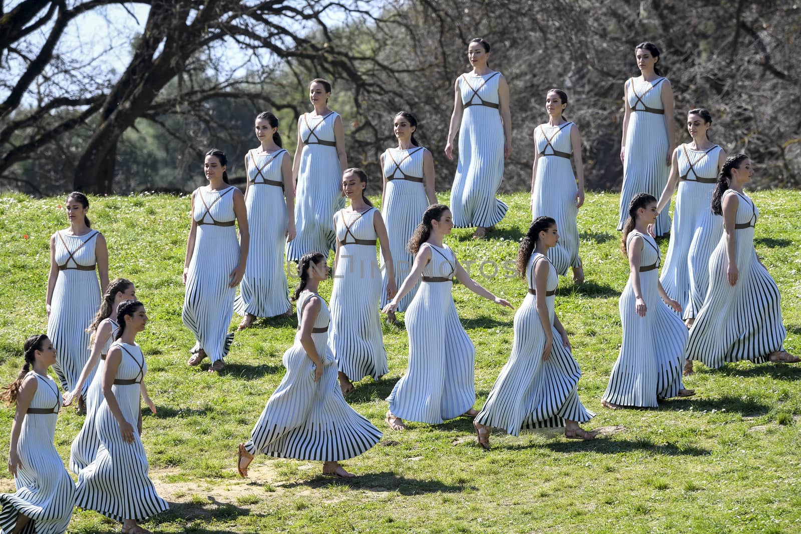 Olympia, Greece -  March 12, 2020: Olympic Flame handover ceremony for the Tokyo 2020 Summer Olympic Games at the Ancient Olympia site, birthplace of the ancient Olympics in southern Greece.