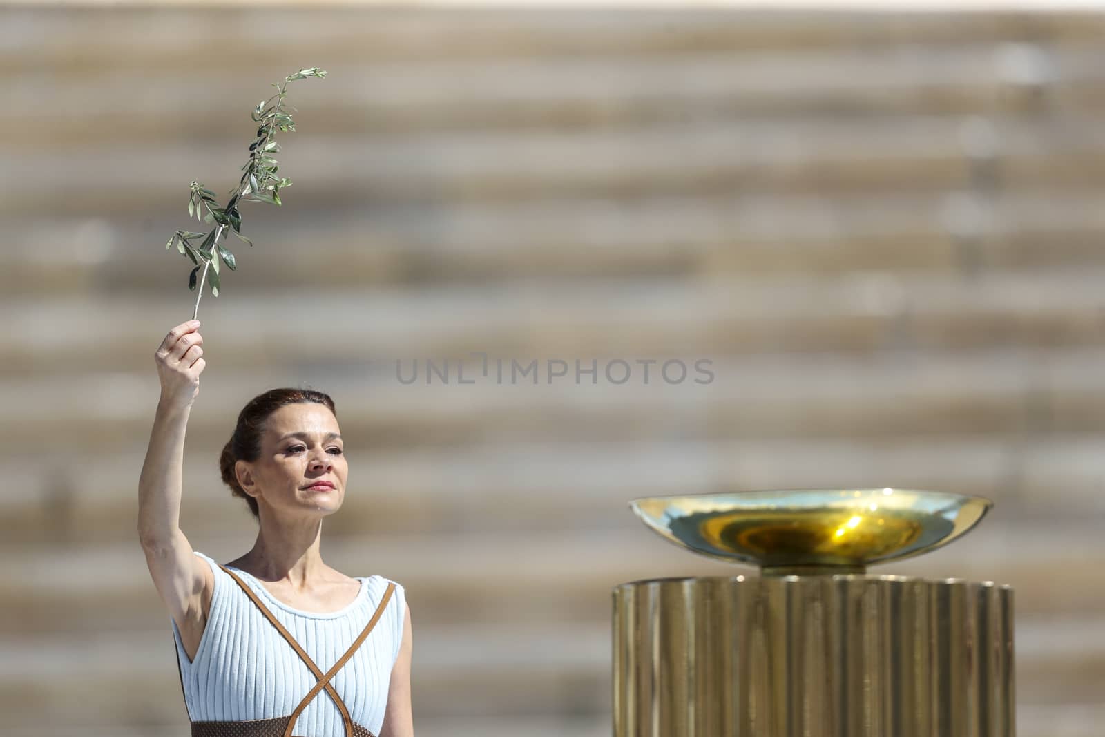 Athens, Greece - March 19, 2020: Olympic Flame handover ceremony for the Tokyo 2020 Summer Olympic Games at the Panathenaic Kallimarmaro Stadium