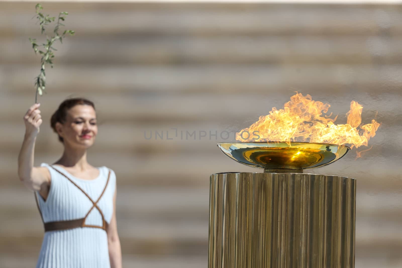 Athens, Greece - March 19, 2020: Olympic Flame handover ceremony for the Tokyo 2020 Summer Olympic Games at the Panathenaic Kallimarmaro Stadium