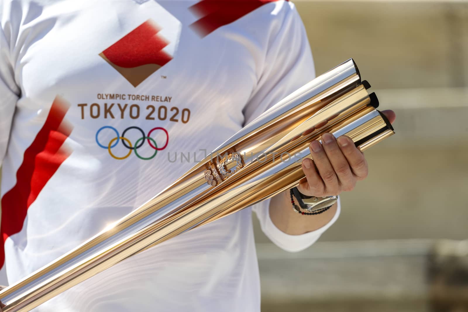 Athens, Greece - March 19, 2020: Olympic Flame handover ceremony for the Tokyo 2020 Summer Olympic Games at the Panathenaic Kallimarmaro Stadium