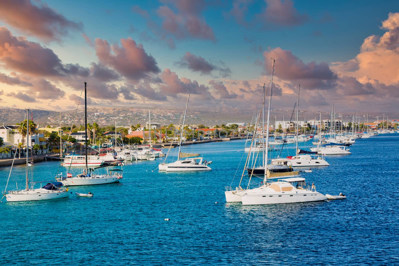 White yachts and sailboats moored off the coast of Bonaire