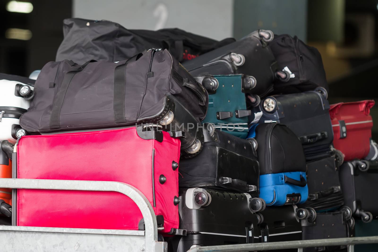  luggage cart on the runway of the airport Macedonia a rainy day by ververidis