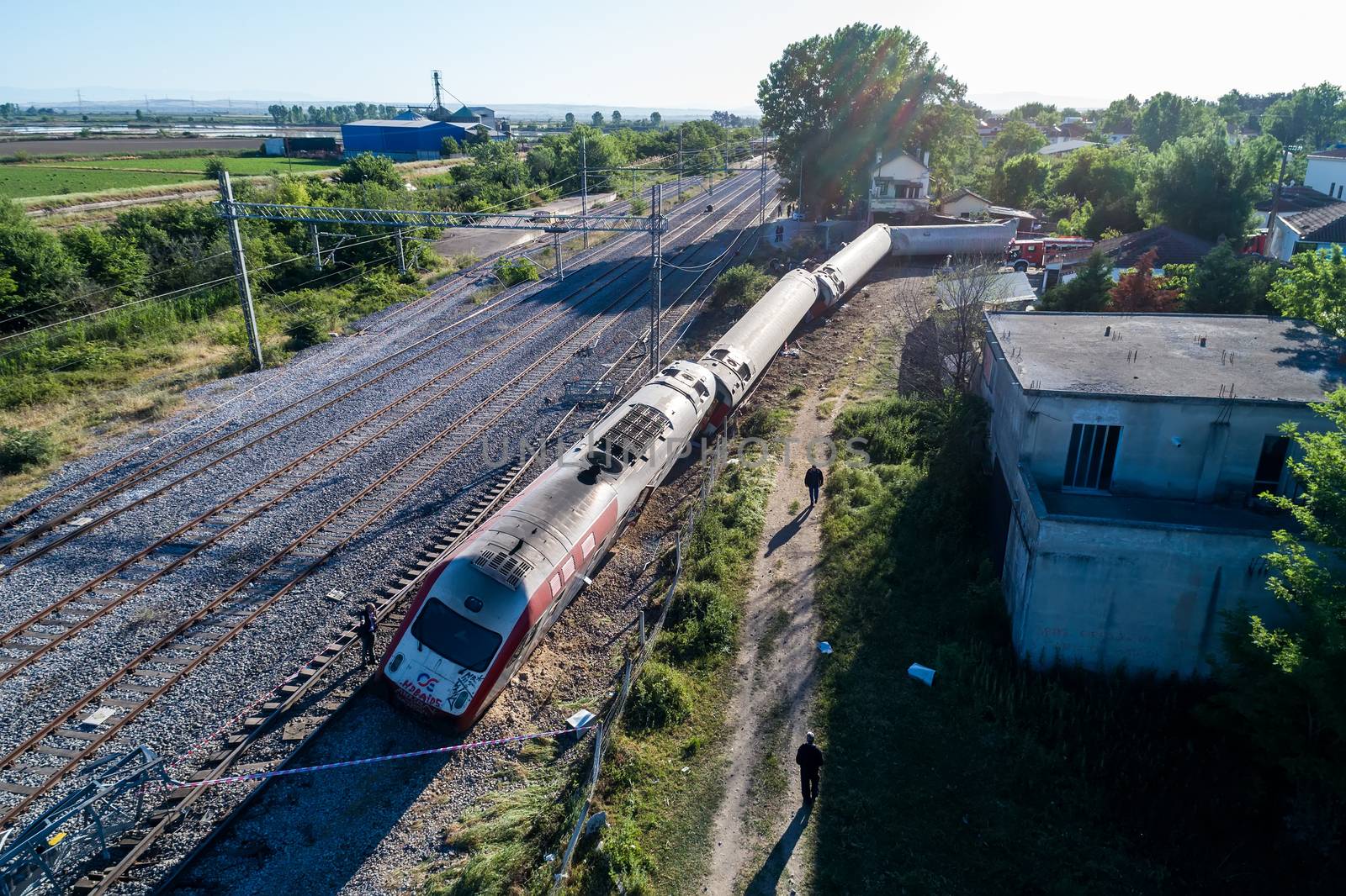 Thessaloniki, Greece - May 14, 2017: Train accident at Adendro, almost 40km west of Thessaloniki, with two confirmed dead among the passengers. The train crashed into a house after derailing.