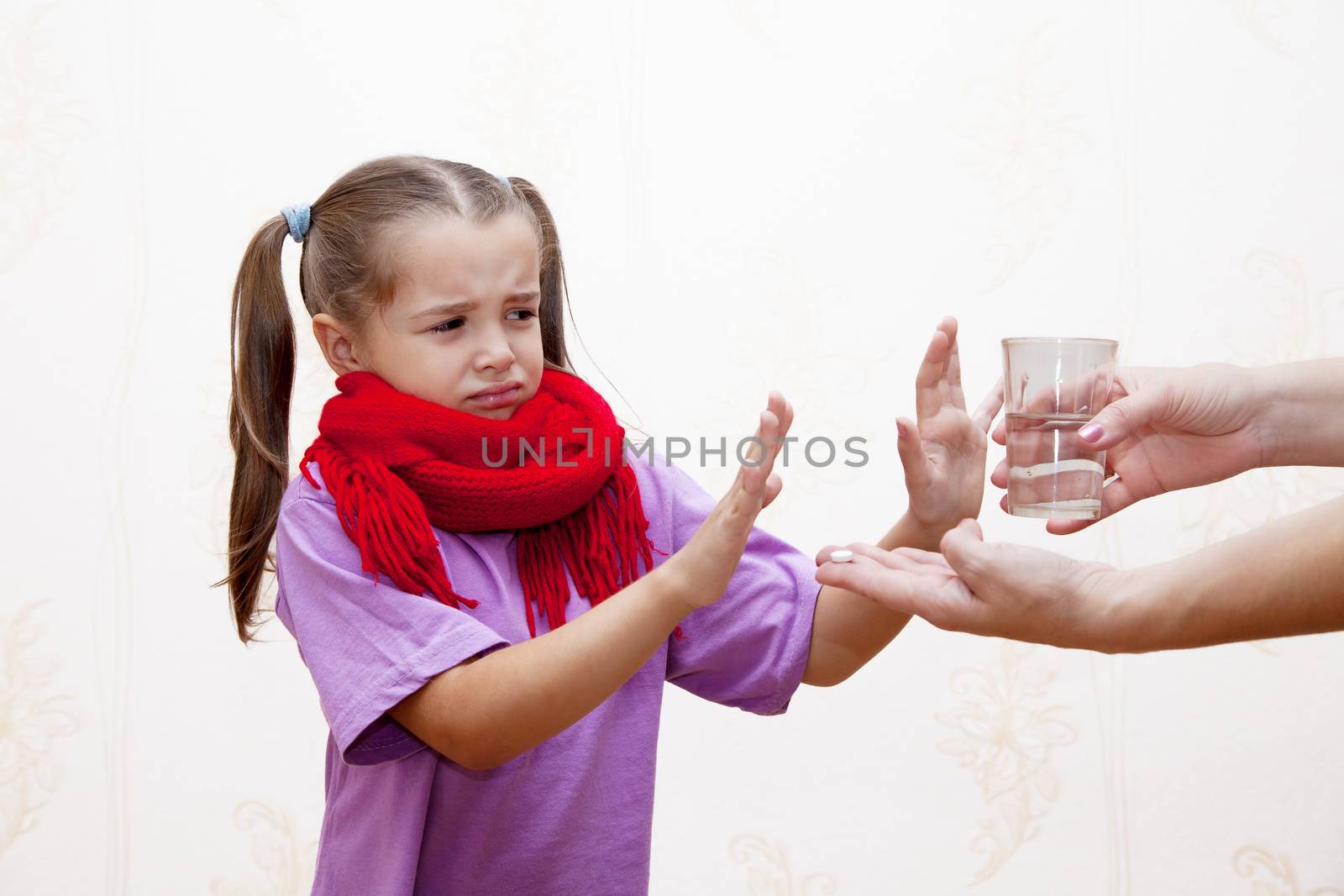 little sick girl refuses to take the medicine