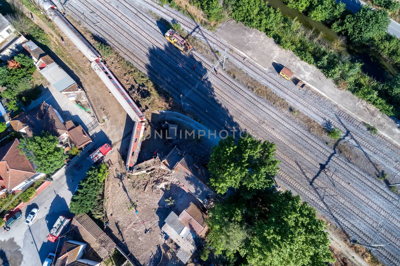 Thessaloniki, Greece - May 14, 2017: Train accident at Adendro, almost 40km west of Thessaloniki, with two confirmed dead among the passengers. The train crashed into a house after derailing.