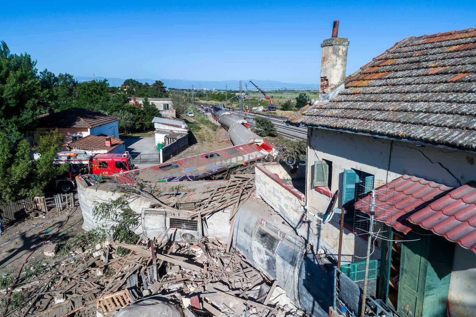 Thessaloniki, Greece - May 14, 2017: Train accident at Adendro, almost 40km west of Thessaloniki, with two confirmed dead among the passengers. The train crashed into a house after derailing.