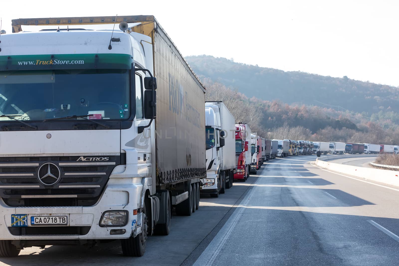 Promachonas, Greece - February 7, 2016 :International transport trucks are blocked  from the border crossing of Promachonas between Greece and Bulgaria, as farmers set up a blockade at customs offices.
