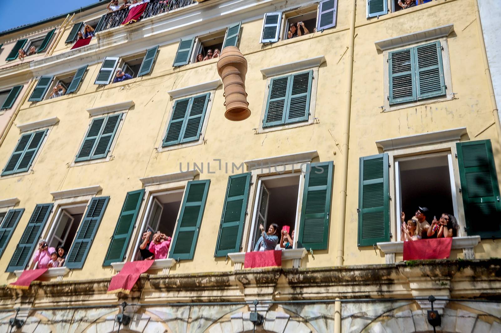 Corfu, Greece - April 27, 2019: Corfians throw clay pots from windows and balconies on Holy Saturday to celebrate the Resurrection of Christ