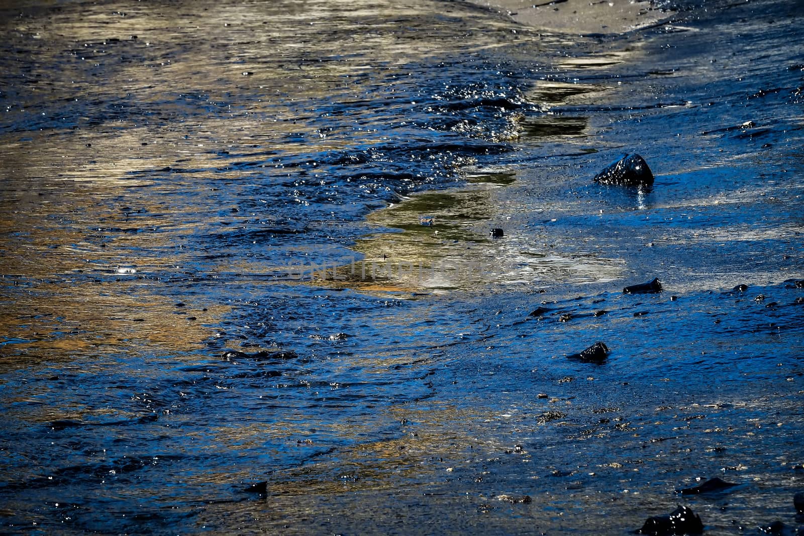 Salamina, Athens, Greece - Sept 13, 2017:Oil, leaked from a sinked ship, come ashore in Salamina Island near Athens, after an old tanker sank close to Salamis island  