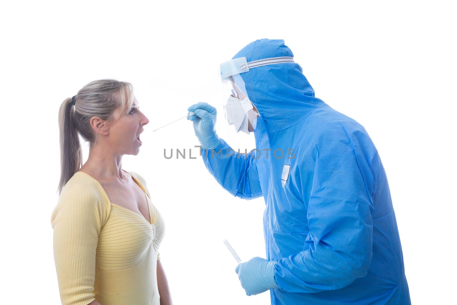 Medical pathologist swabbing a patient for an infectious virus o by lovleah