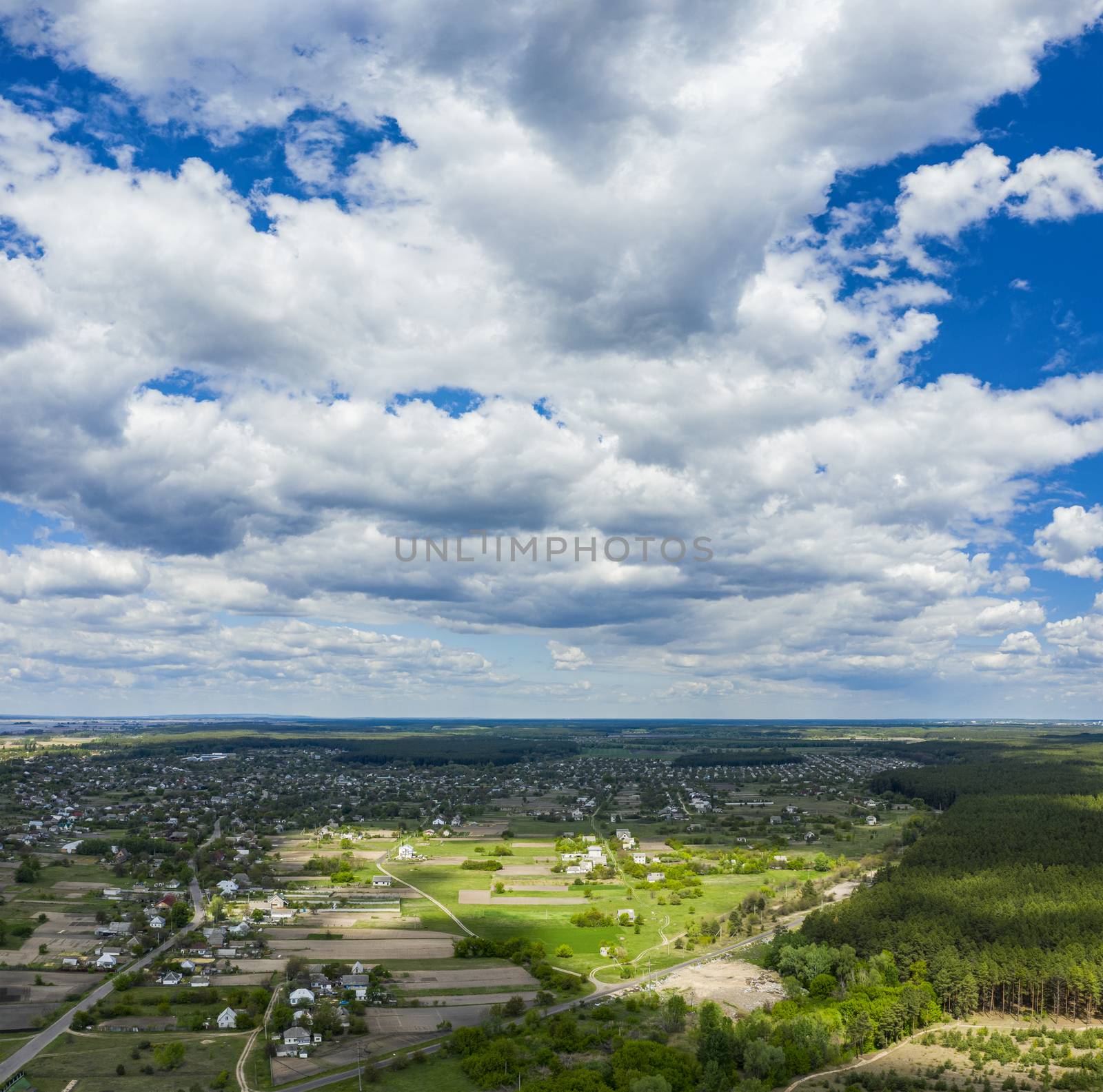 Aerial Flying over countryside with village, forest, ponds, and  by ArtSvitlyna