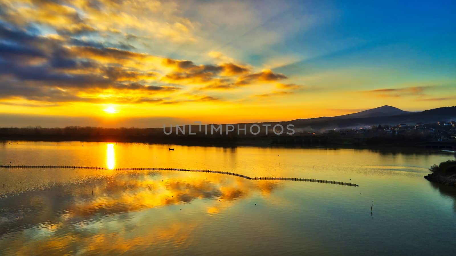 Sunrise over the wetland of Kerkini Lake in northern Greece by ververidis