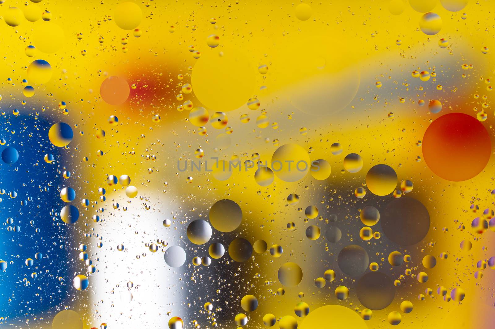 The abstract composition with oil drops in water.  by alexsdriver