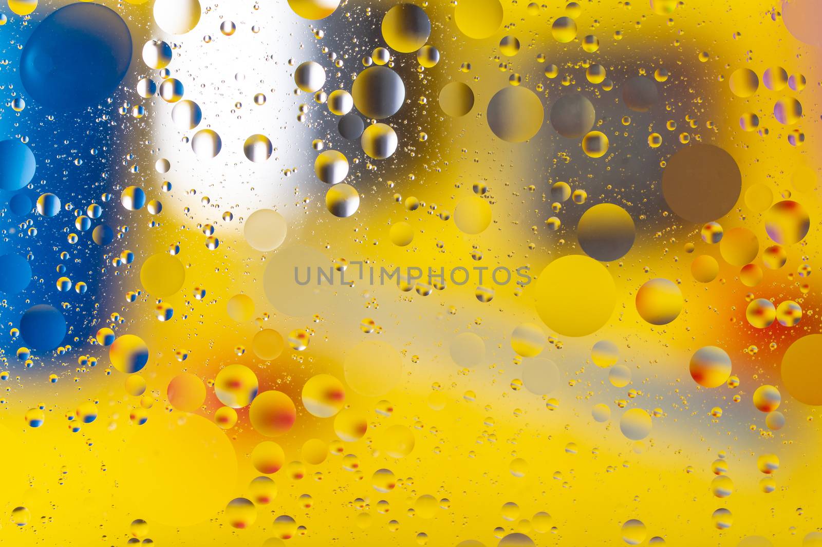 The abstract composition with oil drops in water. 